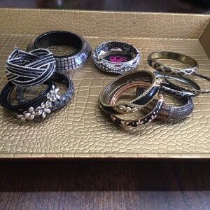 Lot of 11 bracelets. They in great shape. Four are hinged